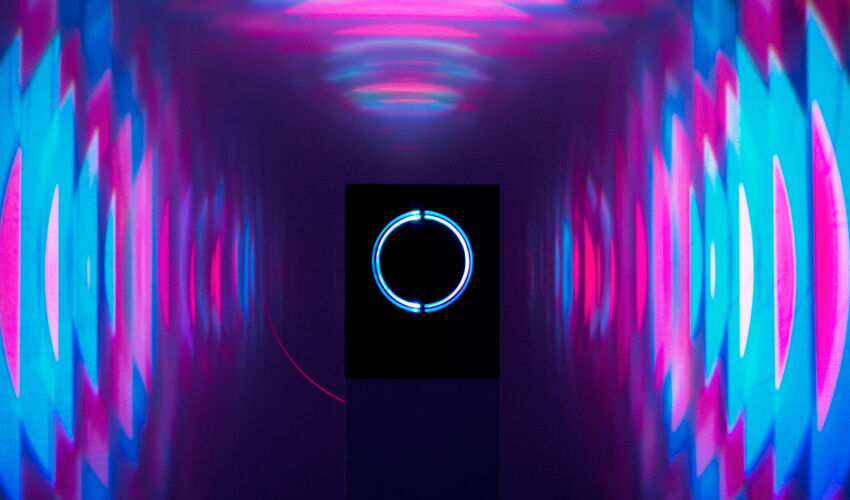 atmosphero light installation featuring a floating sphere, mirrored reflections and dynamic lighting effects as an innovative lighting design concept.