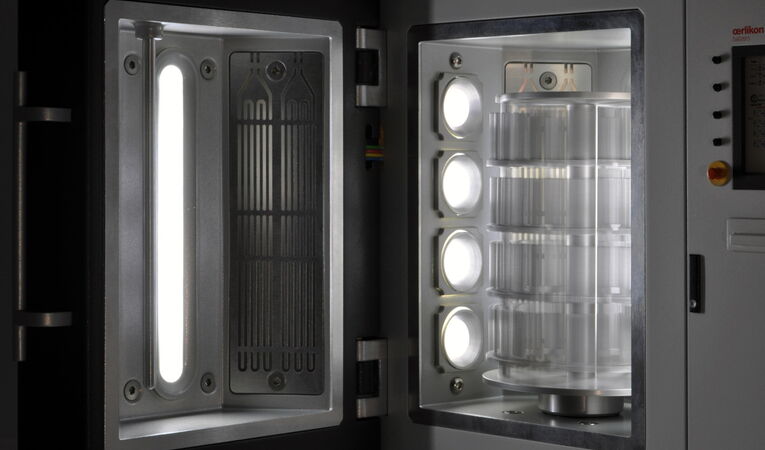 Illuminated process chamber of the 1:10 scale Oerlikon Domino L design model.