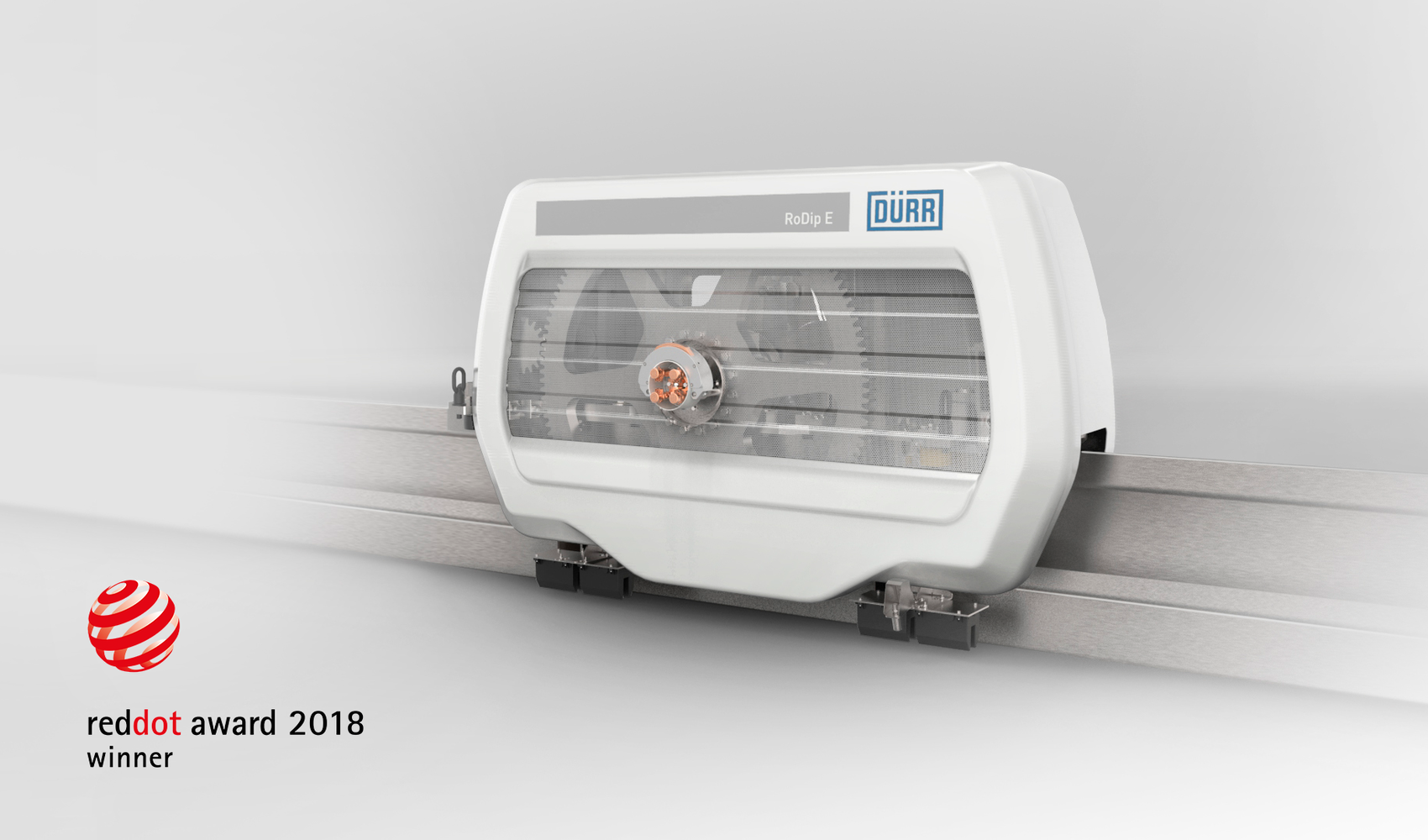 Mit dem Red Dot Design Award ausgezeichnetes Maschinengehäuse des DÜRR RoDip Carriers für automatisierte Fördertechnik in der Automobilproduktion.