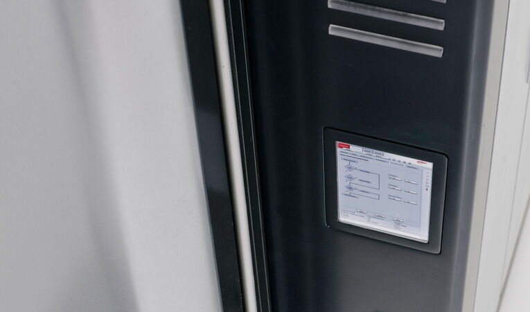 HMI control panel of an Oerlikon industrial design model.