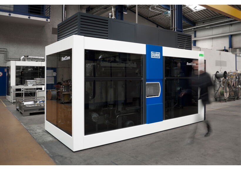 Maschinendesign der Dürr EcoCCore Reinigungsanlage mit großflächiger Mineralglasfront für maximale Sicht auf die integrierte Verfahrenstechnik.