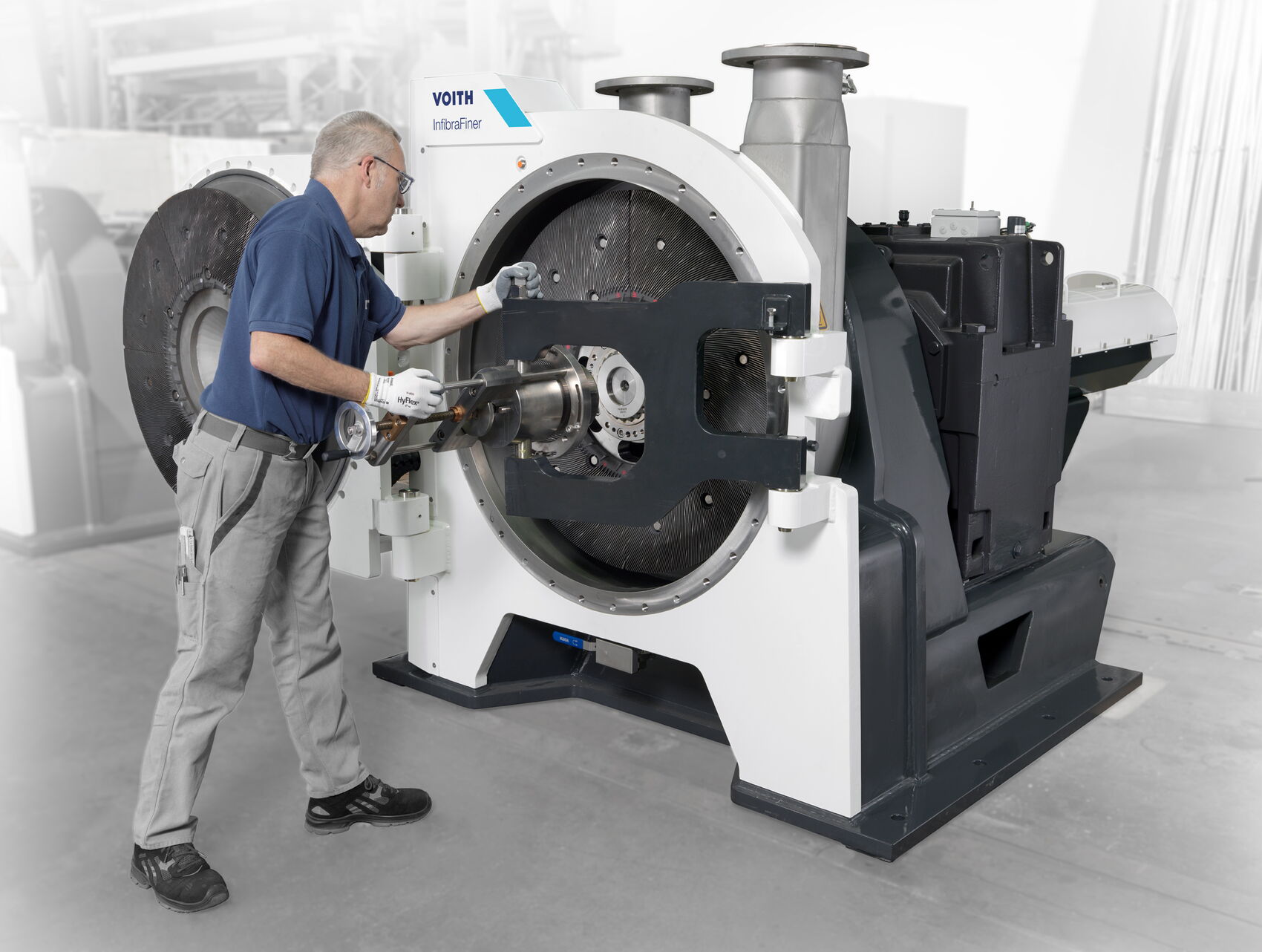 Industrial design of the Voith InfibraFiner with service-friendly machine architecture, providing ergonomic access to the refining unit for fast maintenance, reduced downtime, and reliable operation in heavy-duty paper production.