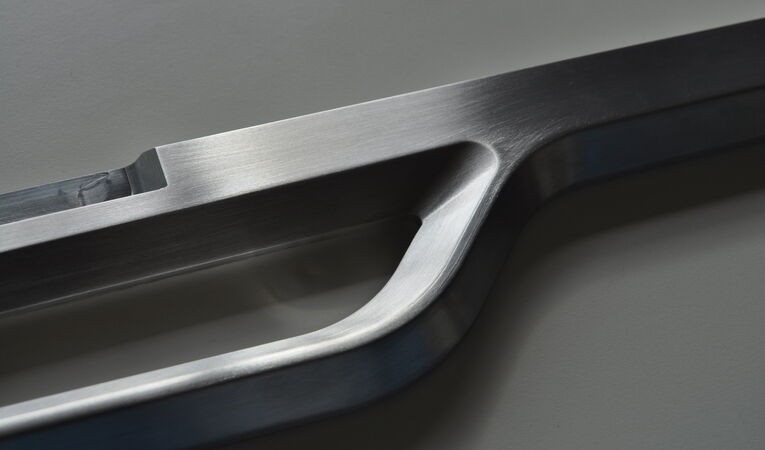 CNC-machined lightweight aluminum structure of an ergonomic control console developed for industrial robotic systems.