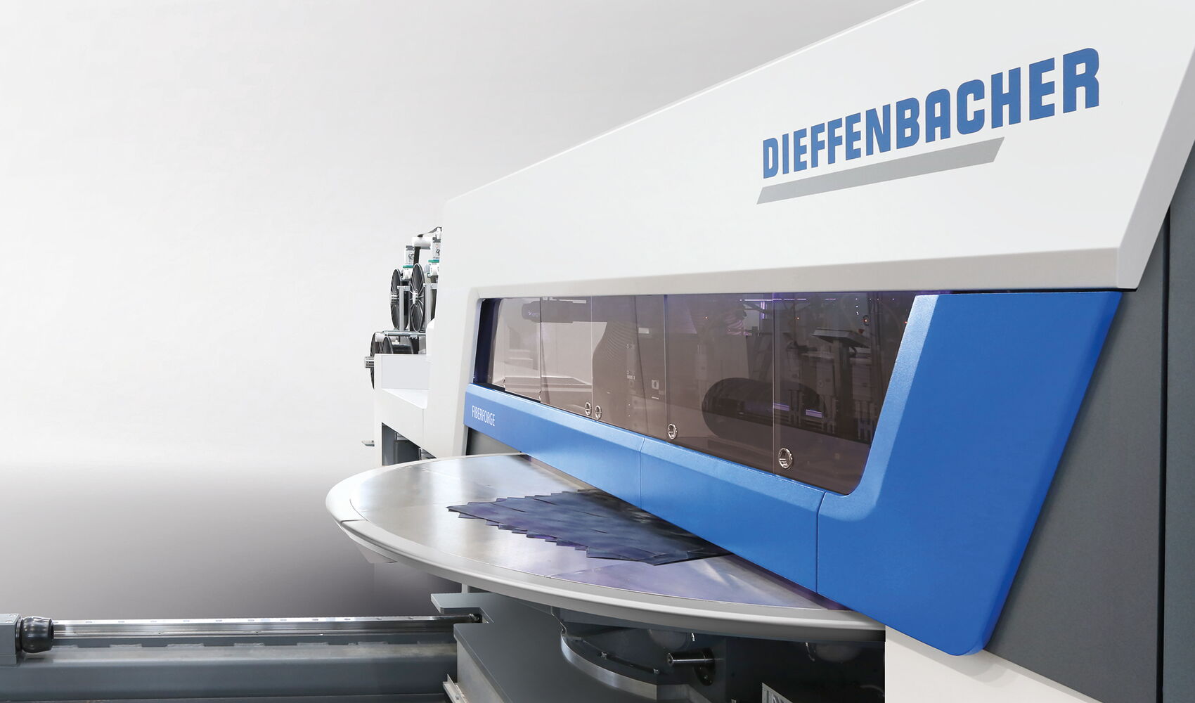 Industrial design of the Dieffenbacher Fiberforge with a tailored machine exterior that visually emphasizes precision, technology and manufacturing expertise.